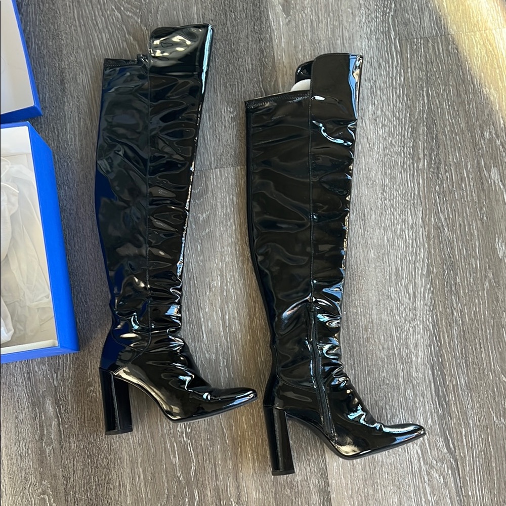 Sleek Stuart Weitzman Black Patent Leather Knee Length Boots with High Heels
